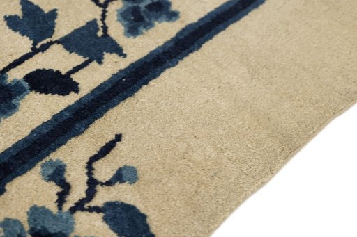 Backside of handmade 1900s Antique Carpets rug showing knot structure and weave density