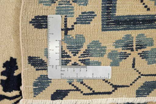 Central medallion detail of 1900s Antique Carpets rug from China