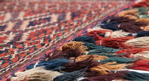 Backside of handmade 1920s Antique Carpets rug showing knot structure and weave density