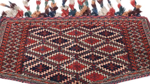 Central medallion detail of 1920s Antique Carpets rug from Uzbekistan