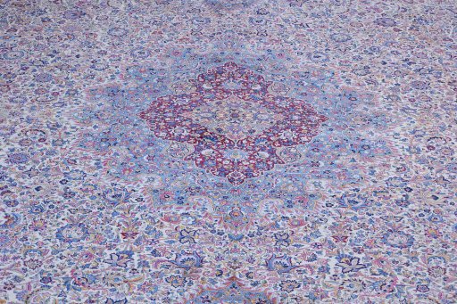 Surface texture of 1920s Antique Carpets rug with natural Wool and intricate pattern