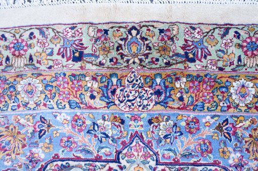 Central medallion detail of 1920s Antique Carpets rug from Iran / Persia