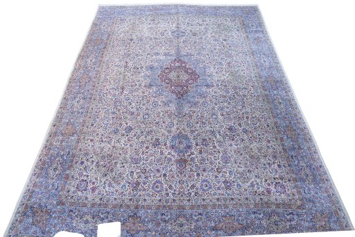 Central medallion detail of 1920s Antique Carpets rug from Iran / Persia
