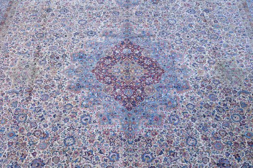 Close-up detail of 1920s Antique Carpets rug from Iran / Persia showing Wool weave