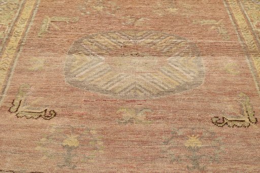 Close-up detail of 1900s Antique Carpets rug from Uzbekistan showing Wool weave