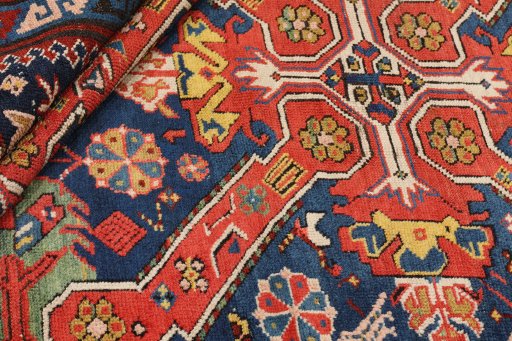 Corner detail of 1900s Antique Carpets rug showing border pattern and Wool pile