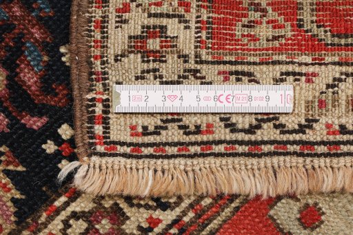 Full view of 1880s Antique Carpets rug from Iran / Persia, 318 × 117 cm in Dark blue tones