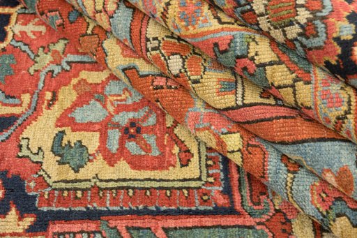 Corner detail of 1920s Antique Carpets rug showing border pattern and Wool pile