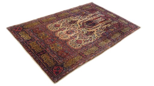 Close-up detail of 1920s Antique Carpets rug from Iran / Persia showing Wool weave