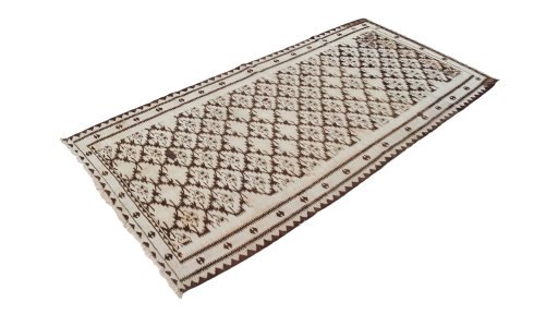 Corner detail of 1920s Kilim Antique rug showing border pattern and Wool pile