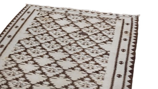 Surface texture of 1920s Kilim Antique rug with natural Wool and intricate pattern