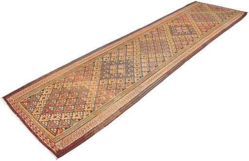 Corner detail of 1920s Kilim Antique rug showing border pattern and Wool pile