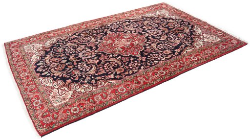 Corner detail of 1950s Semi-antique Carpets rug showing border pattern and Wool pile