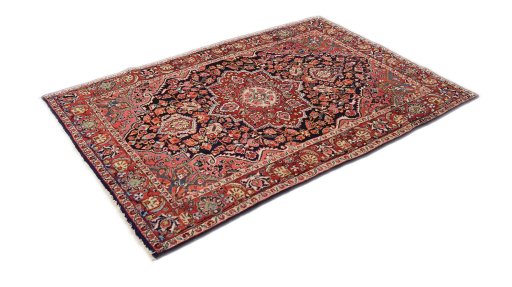 Close-up detail of 1950s Semi-antique Carpets rug from Iran / Persia showing Wool weave