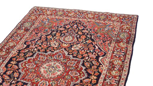 Surface texture of 1950s Semi-antique Carpets rug with natural Wool and intricate pattern