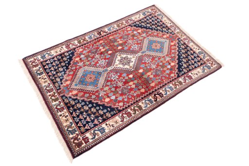 Corner detail of 1955s Semi-antique Carpets rug showing border pattern and Wool pile
