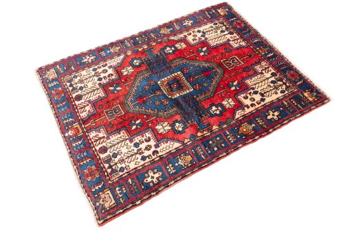 Close-up detail of 1970s Semi-antique Carpets rug from Iran / Persia showing Wool weave
