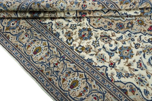 Close-up detail of 2000s Kashan rug from Iran / Persia showing Wool weave
