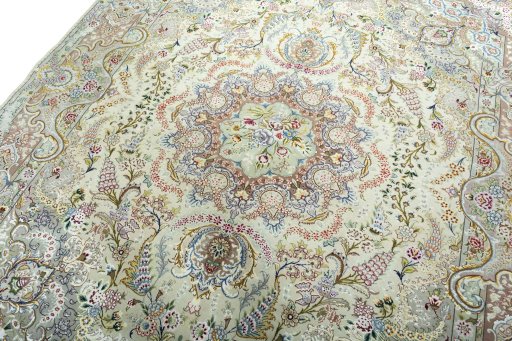 Backside of handmade New Tabriz 50/60/70 Raj rug showing knot structure and weave density