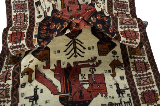 Corner detail of 1930s Baloch rug showing border pattern and Wool pile