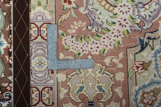Backside of handmade New Tabriz 50/60/70 Raj rug showing knot structure and weave density