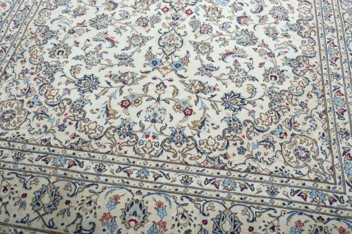 Close-up detail of 2000s Kashan rug from Iran / Persia showing Wool weave