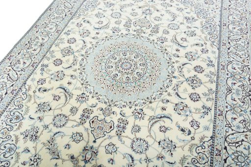 Backside of handmade 2000s Nain rug showing knot structure and weave density