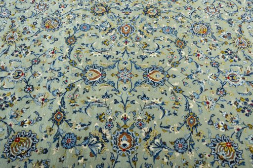 Central medallion detail of 2000s Kashan rug from Iran / Persia