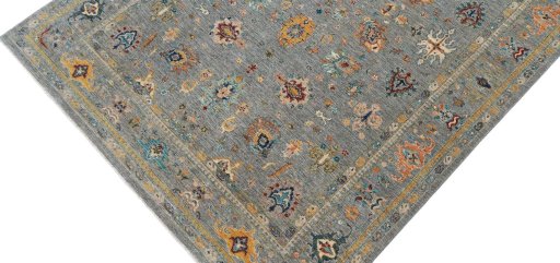 Backside of handmade New Farahan rug showing knot structure and weave density