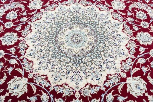 Central medallion detail of New Nain rug from Iran / Persia