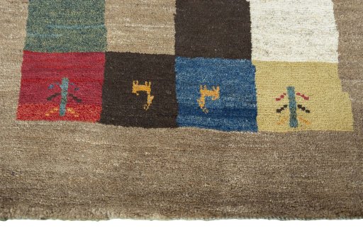 Central medallion detail of 2000s Persian Gabbeh rug from Pakistan