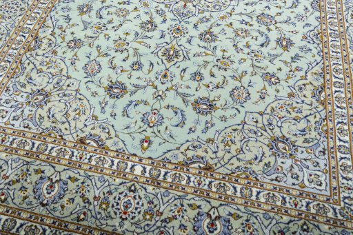 Close-up detail of 2000s Kashan rug from Iran / Persia showing Wool weave
