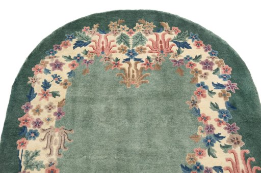 Surface texture of 1940s China rug with natural Wool and intricate pattern