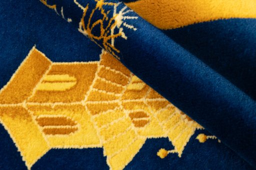 Corner detail of 1950s China rug showing border pattern and Wool pile