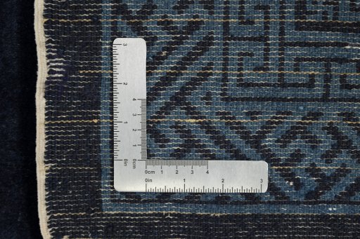 Close-up detail of 1990s China rug from Iran / Persia showing Wool weave