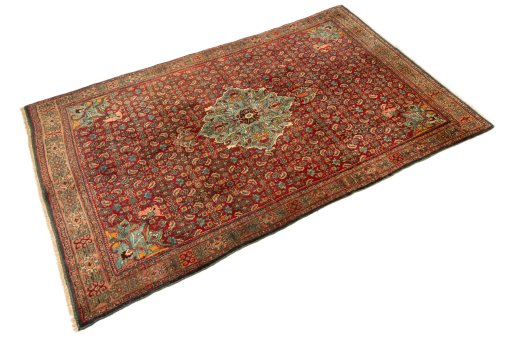 Corner detail of 1920s Bijar rug showing border pattern and Wool pile