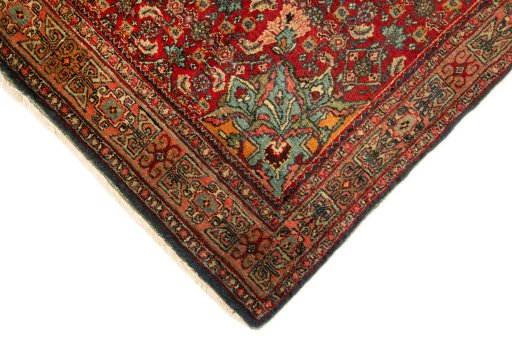 Backside of handmade 1920s Bijar rug showing knot structure and weave density