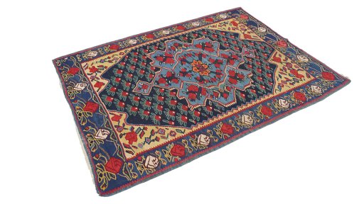 Corner detail of 1920s Bijar rug showing border pattern and Wool pile