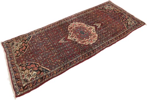 Corner detail of 1920s Bijar rug showing border pattern and Wool pile