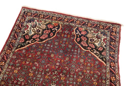 Surface texture of 1920s Bijar rug with natural Wool and intricate pattern