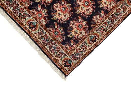 Backside of handmade New Bijar rug showing knot structure and weave density