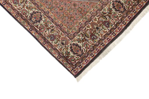 Backside of handmade New Bijar rug showing knot structure and weave density