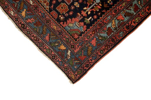 Backside of handmade 1900s Bijar rug showing knot structure and weave density