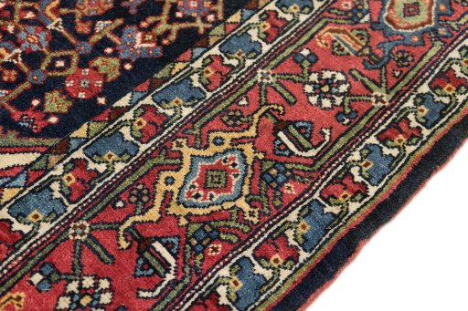 Close-up detail of 1920s Bijar rug from Iran / Persia showing Wool weave
