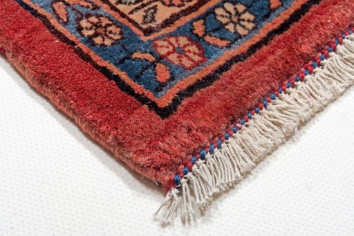 Backside of handmade 2000s Bijar rug showing knot structure and weave density
