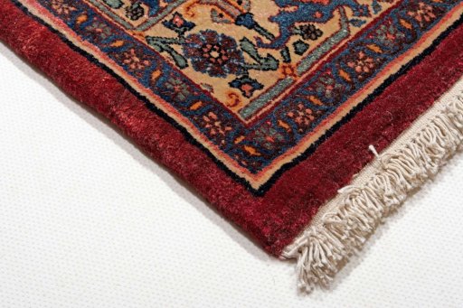 Backside of handmade 1950s Bijar rug showing knot structure and weave density