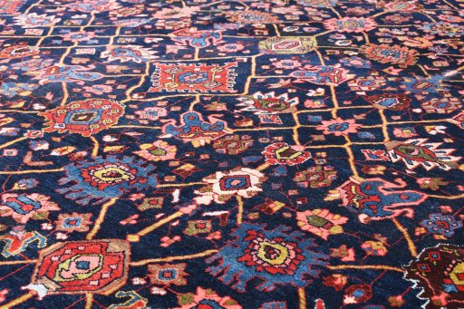 Surface texture of 1930s Bijar rug with natural Wool and intricate pattern