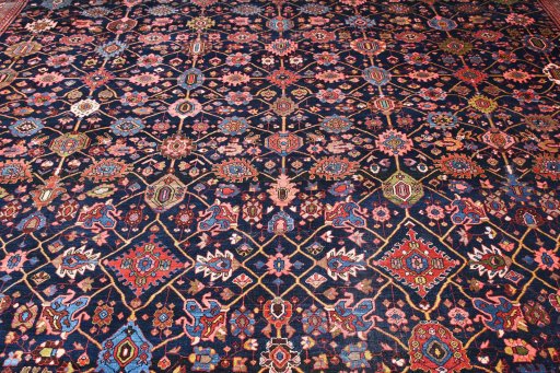 Corner detail of 1930s Bijar rug showing border pattern and Wool pile