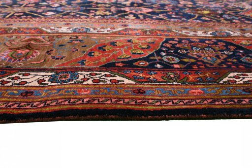 Backside of handmade 1930s Bijar rug showing knot structure and weave density