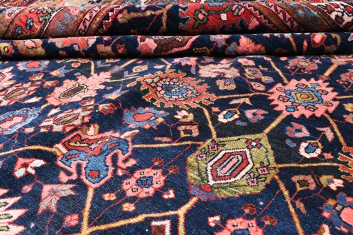 Full view of 1930s Bijar rug from Iran / Persia, 566 × 389 cm in Blue tones